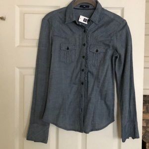 Woman’s denim jean shirt with ruffle. Brand new!